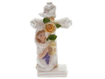 Communiemeisje met kruis en bloem